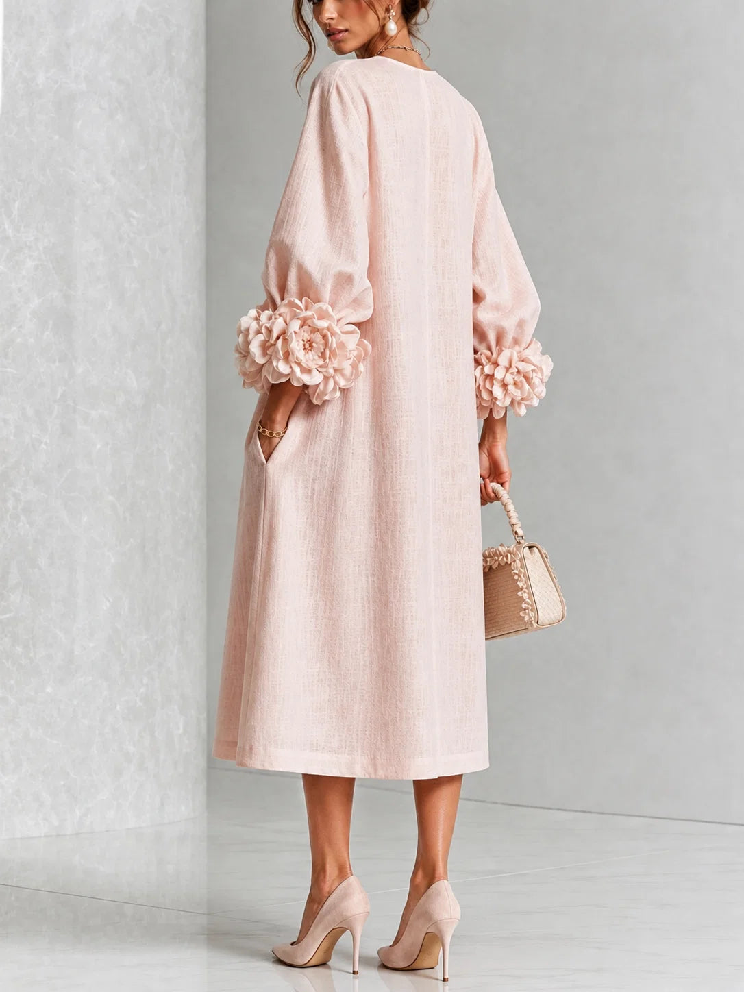 Élise-Robe midi rose à boutons et motif floral