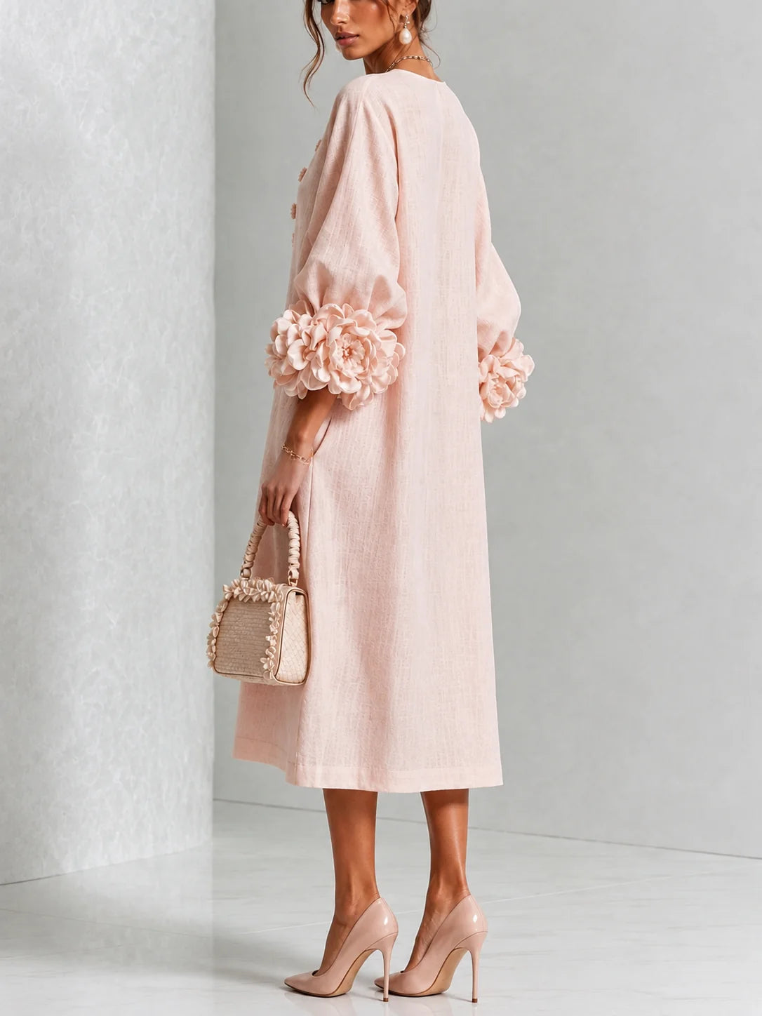 Élise-Robe midi rose à boutons et motif floral